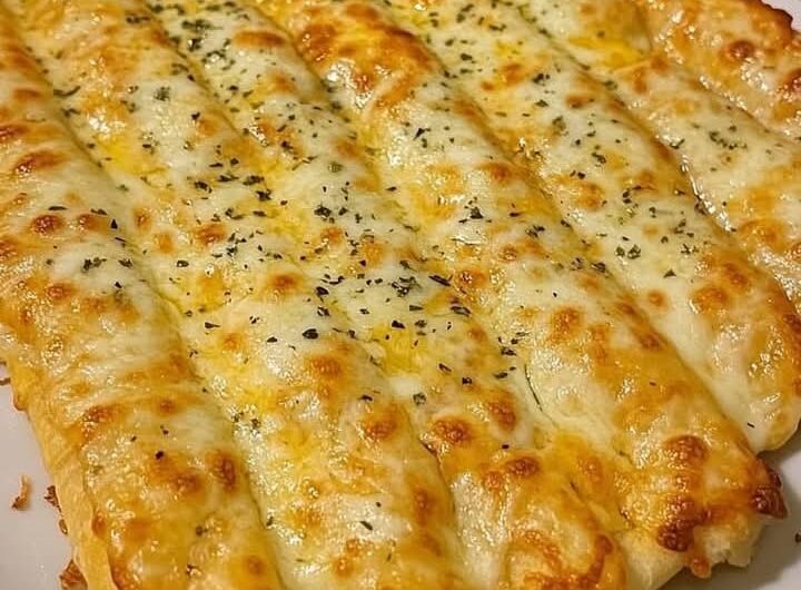 Homemade Cheesy Garlic Breadsticks Share