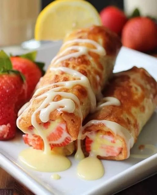 Delightful Strawberry Cheesecake Egg Rolls with Lemon Glaze